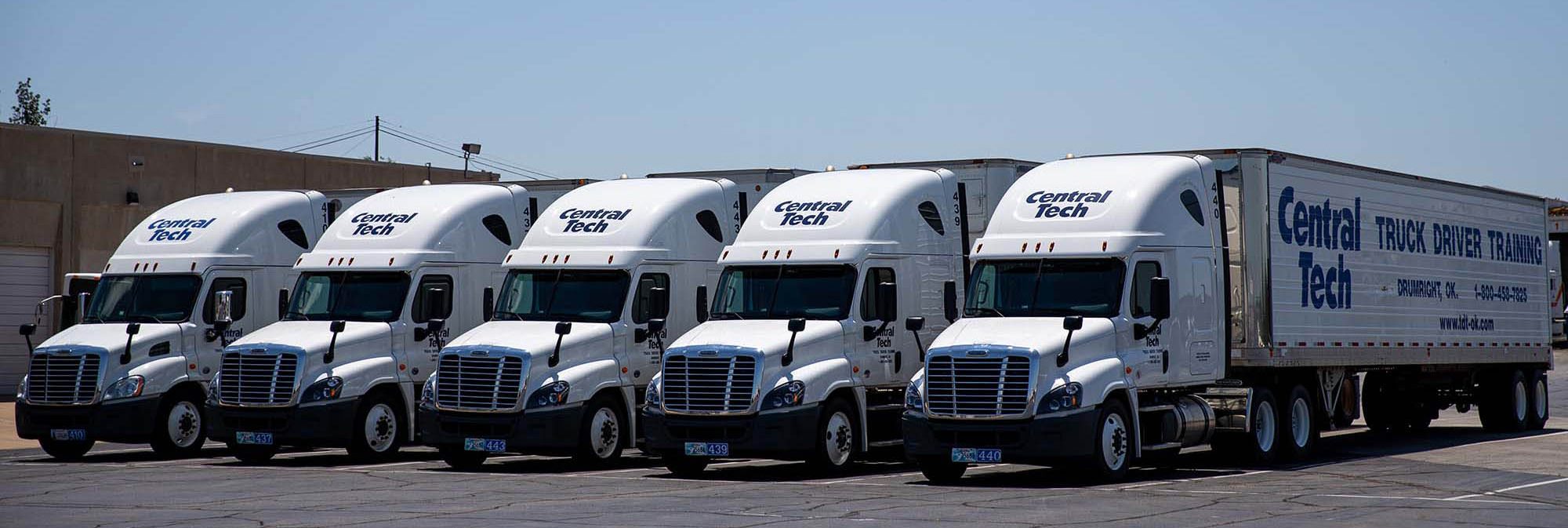 row of semi trucks at Central Tech for Truck Driver Training