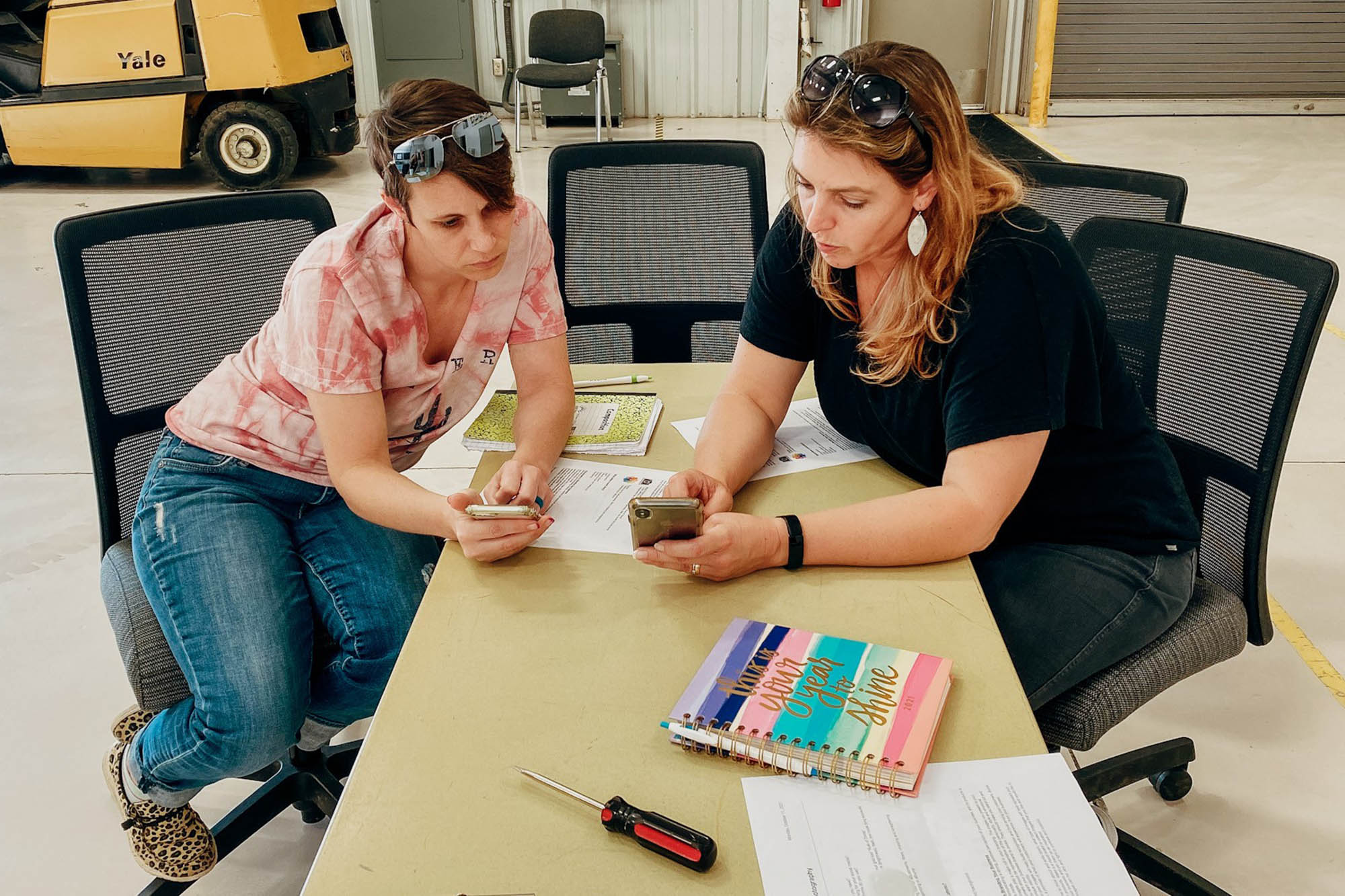 Central Tech adjunct instructor teaching a student how to take better product photos with her cell phone