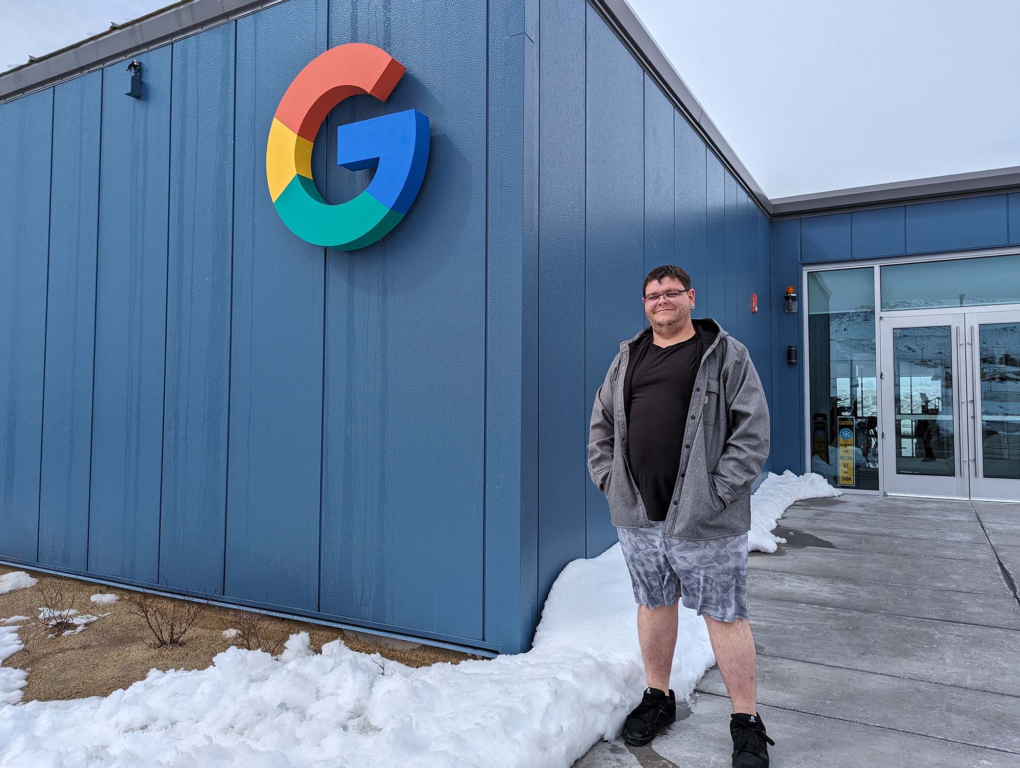 Central Tech alumnus Peter Sansing standing in front of the Google building where he works