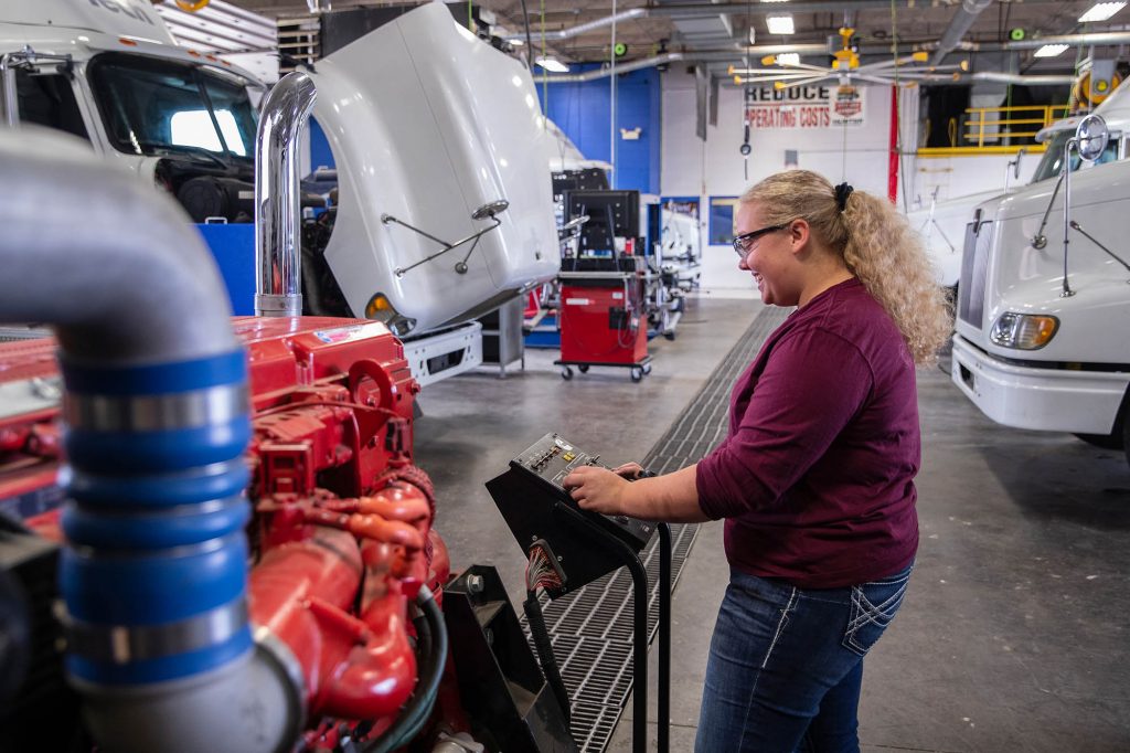 Central Tech diesel student working on trucks