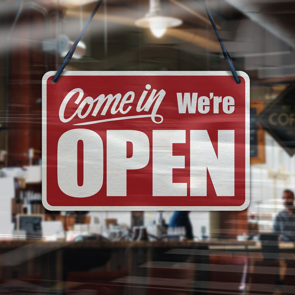 open sign in a business window