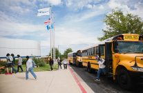 Students getting off the bus at Central Tech in Drumright