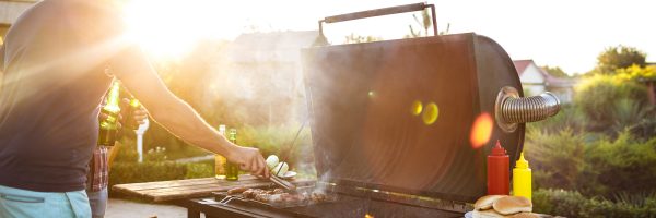 man grilling outside